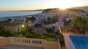A coastal cityscape with buildings, a clear sky, and a sunset. - ONE OF THE MOST BEAUTIFUL VIEWS OF NICE / MONT BORON / BASSE CORNICHE -  (Nice)