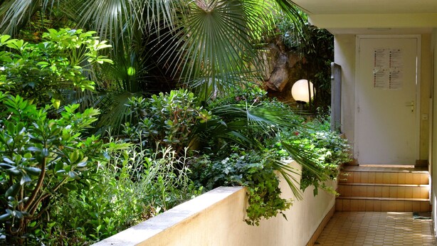 A narrow indoor corridor with a concrete retaining wall on one side and a tiled floor. - ONE OF THE MOST BEAUTIFUL VIEWS OF NICE / MONT BORON / BASSE CORNICHE -  (Nice)
