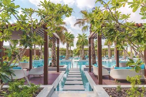 4 indoor pools, outdoor pool, open 9:00 AM to 9:00 PM, free cabanas