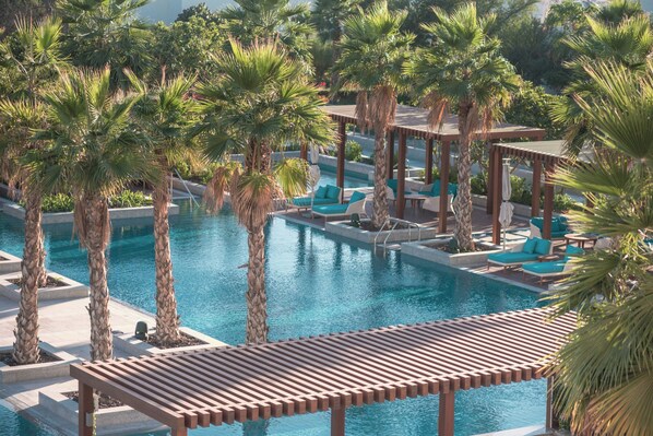 4 indoor pools, outdoor pool, open 9:00 AM to 9:00 PM, free pool cabanas