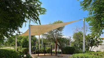 Relax and stay active in this serene outdoor space surrounded by lush greenery.
