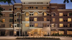 A multi-story building with a sign reading "Cotton House." - Cotton House, Cleveland, a Tribute Portfolio Hotel (Cleveland)