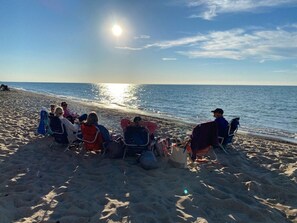 On the beach, sun-loungers, beach towels