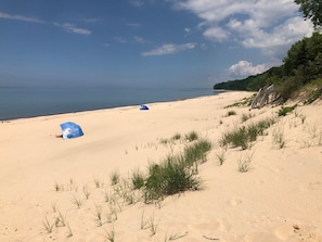 On the beach, sun-loungers, beach towels