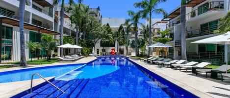 Outdoor pool, pool umbrellas, pool loungers