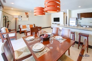 Deluxe Apartment, Kitchen, Pool View | Dining room