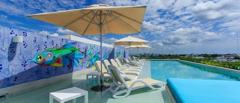 Outdoor pool, pool umbrellas, sun loungers