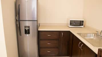 Fridge, microwave, cookware/dishes/utensils
