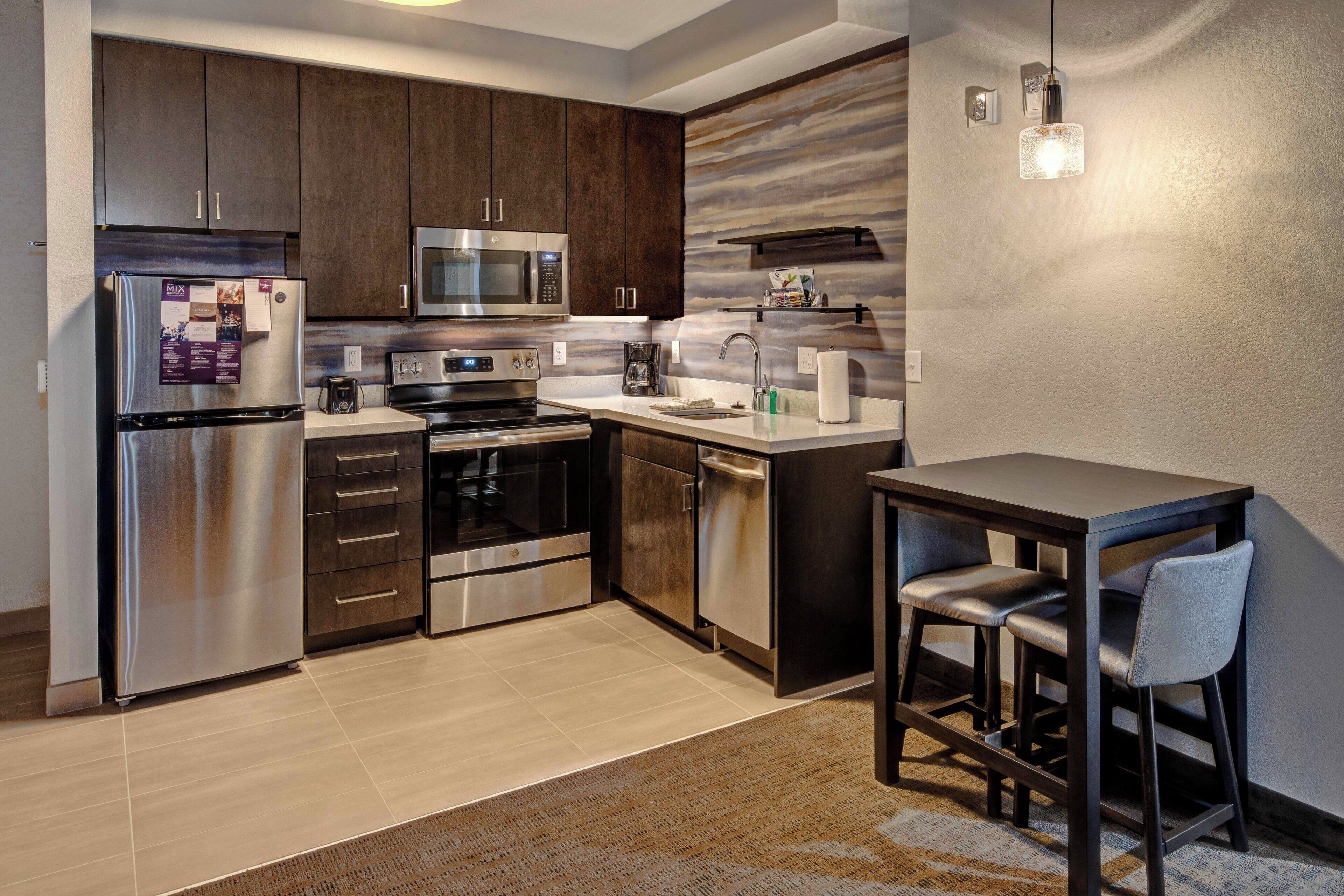 suite, 1 bedroom | private kitchen | full-sized fridge, microwave, oven, stovetop