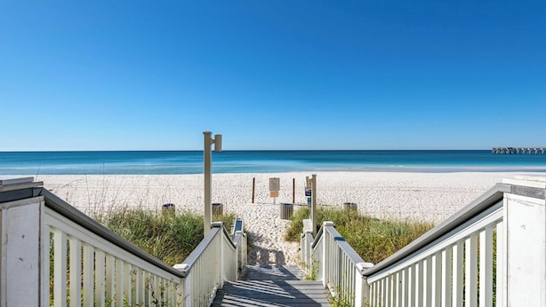 A beach with a wooden staircase leading down to the sand, a pier in the distance, and clear blue skies. - Joanna House! Seagrove Beach Cottage, Private Pool, Spacious, close to Seaside. (Seagrove Beach)
