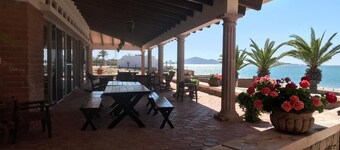 Beautiful beachfront 7 BR 6.5 BtR  colonial style estate on 30,000 sqft lot