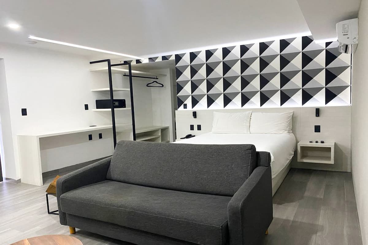 Suíte júnior, 2 camas Queen, para não fumantes | Roupas de cama premium, cofres nos quartos