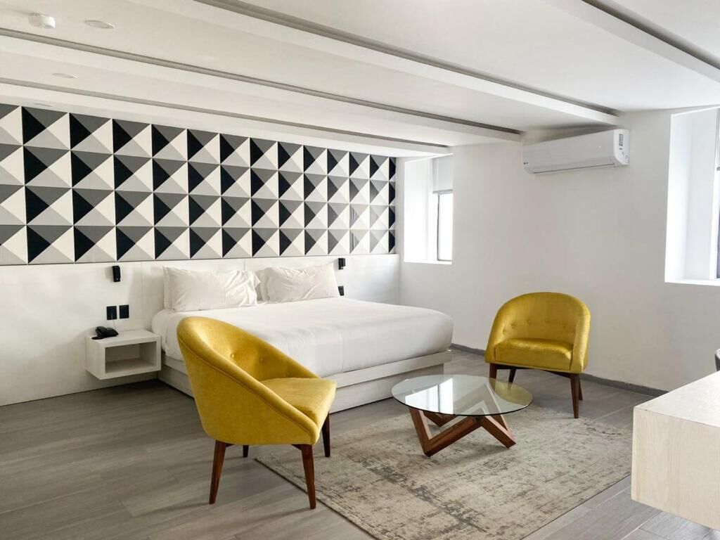 Suite junior, 1 cama King size, para no fumadores | Ropa de cama de alta calidad y caja de seguridad en la habitación 