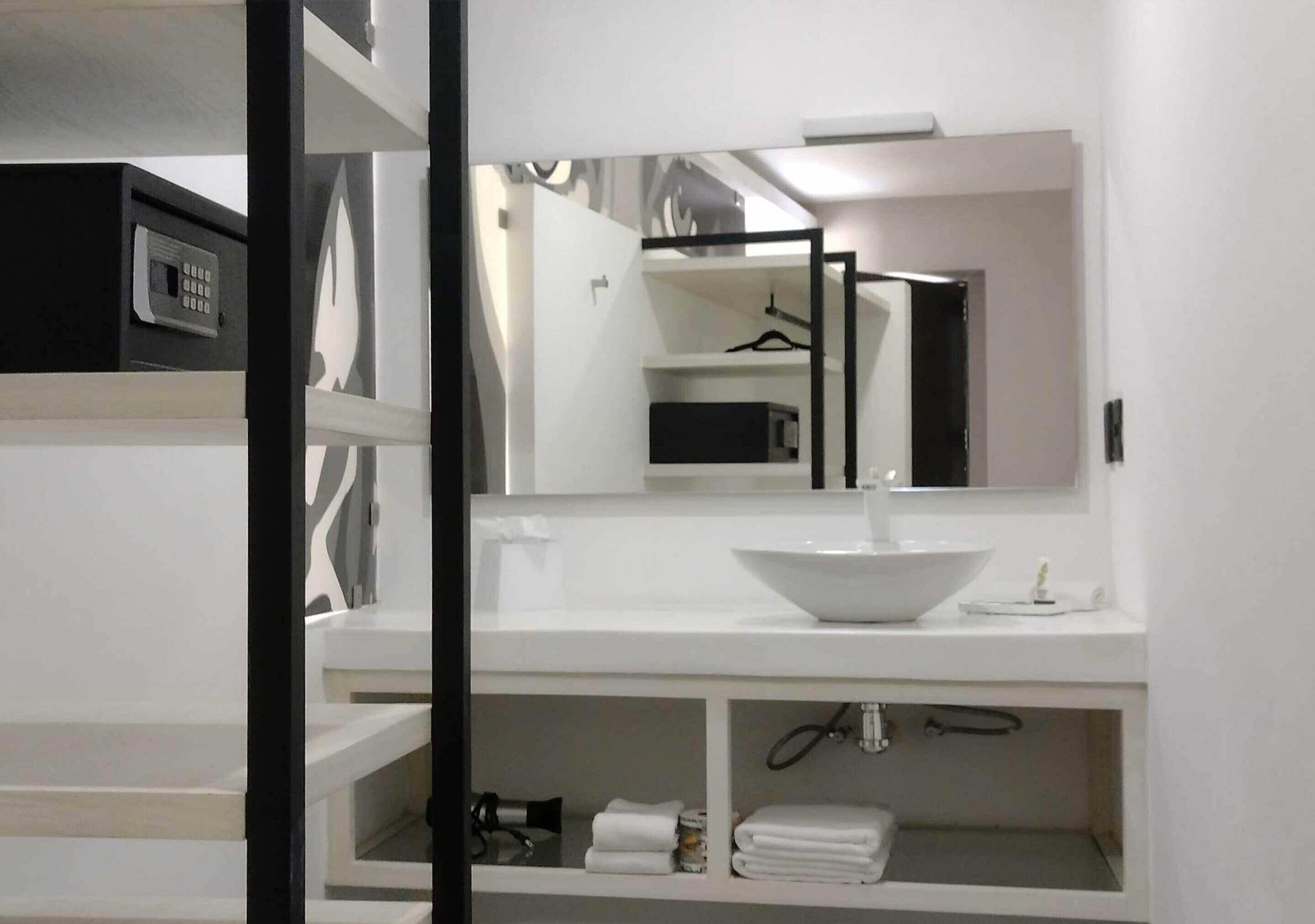 junior suite, 1 queen bed, non smoking | bathroom | shower, rainfall showerhead, free toiletries, hair dryer