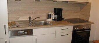 Apartment directly on the beach in Norddeich Parking lot at the house