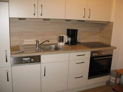 Apartment directly on the beach in Norddeich Parking lot at the house