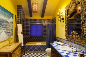 Combined shower/bathtub, hair dryer, towels, soap