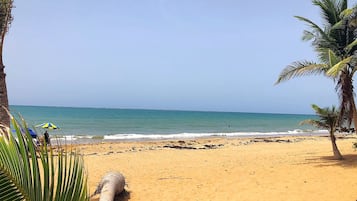 On the beach, sun loungers, beach towels