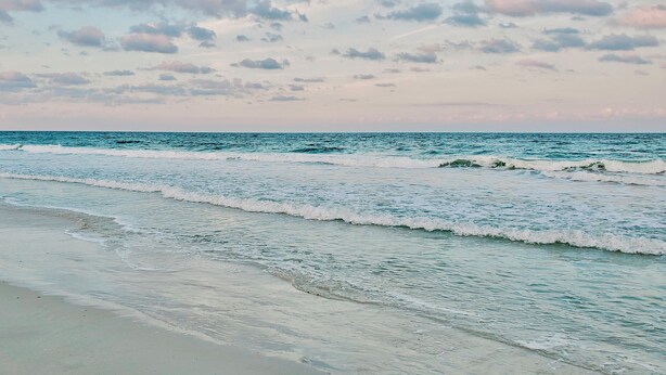 A beach with gentle waves and a clear sky. - 616 Surf Villas, Oceanfront Condo, BAM Vacation Rentals (Ponte Vedra Beach)