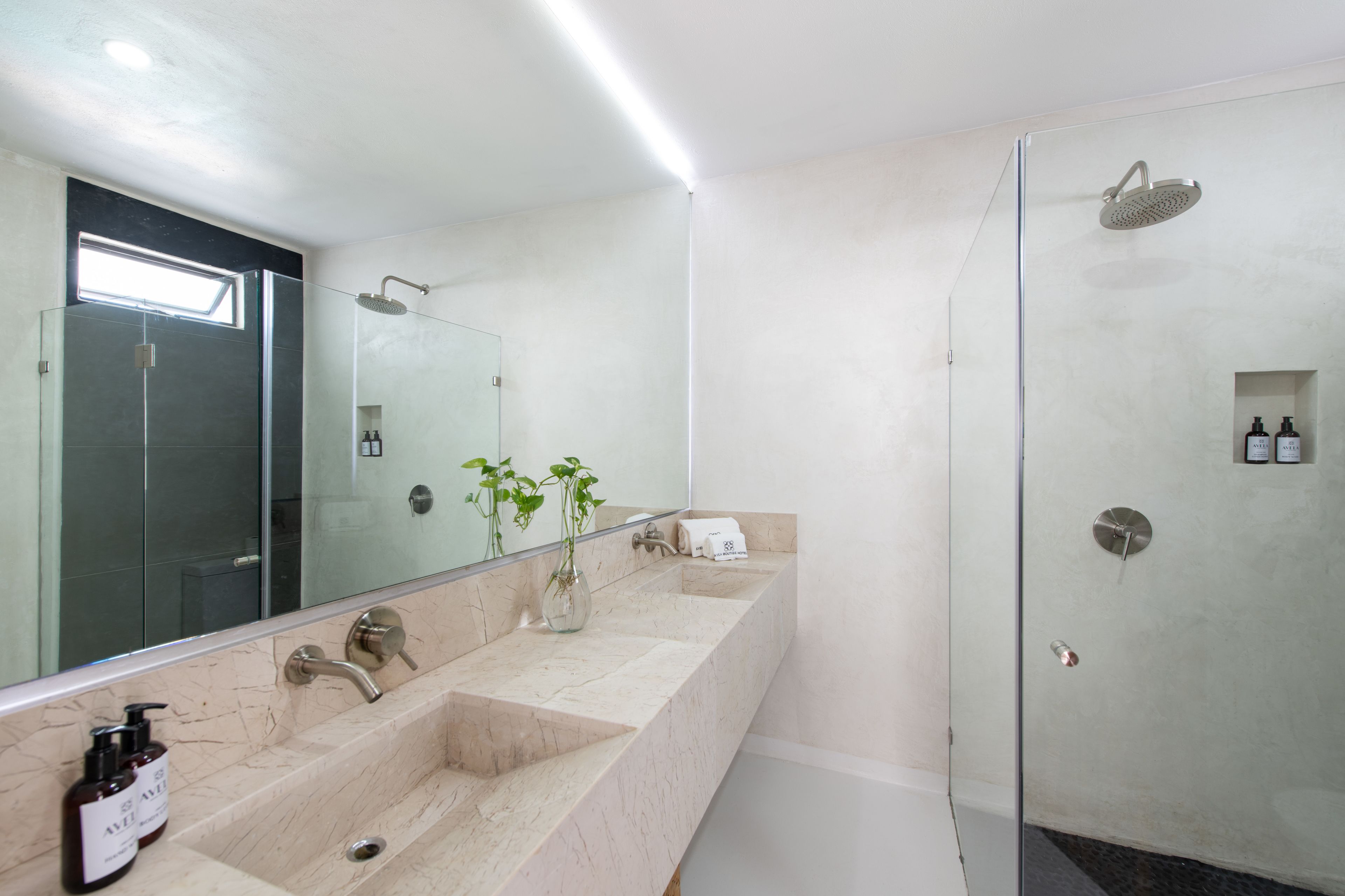 master suite with kitchen | bathroom | shower, rainfall showerhead, designer toiletries, hair dryer