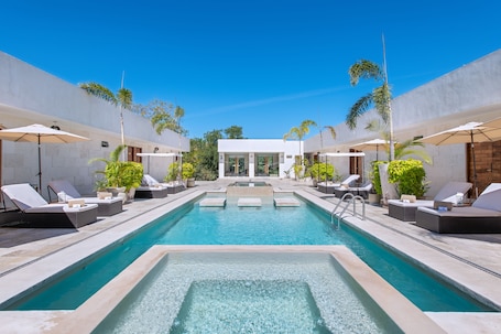 Outdoor pool, open 8:00 AM to 10:30 PM, pool umbrellas, sun loungers