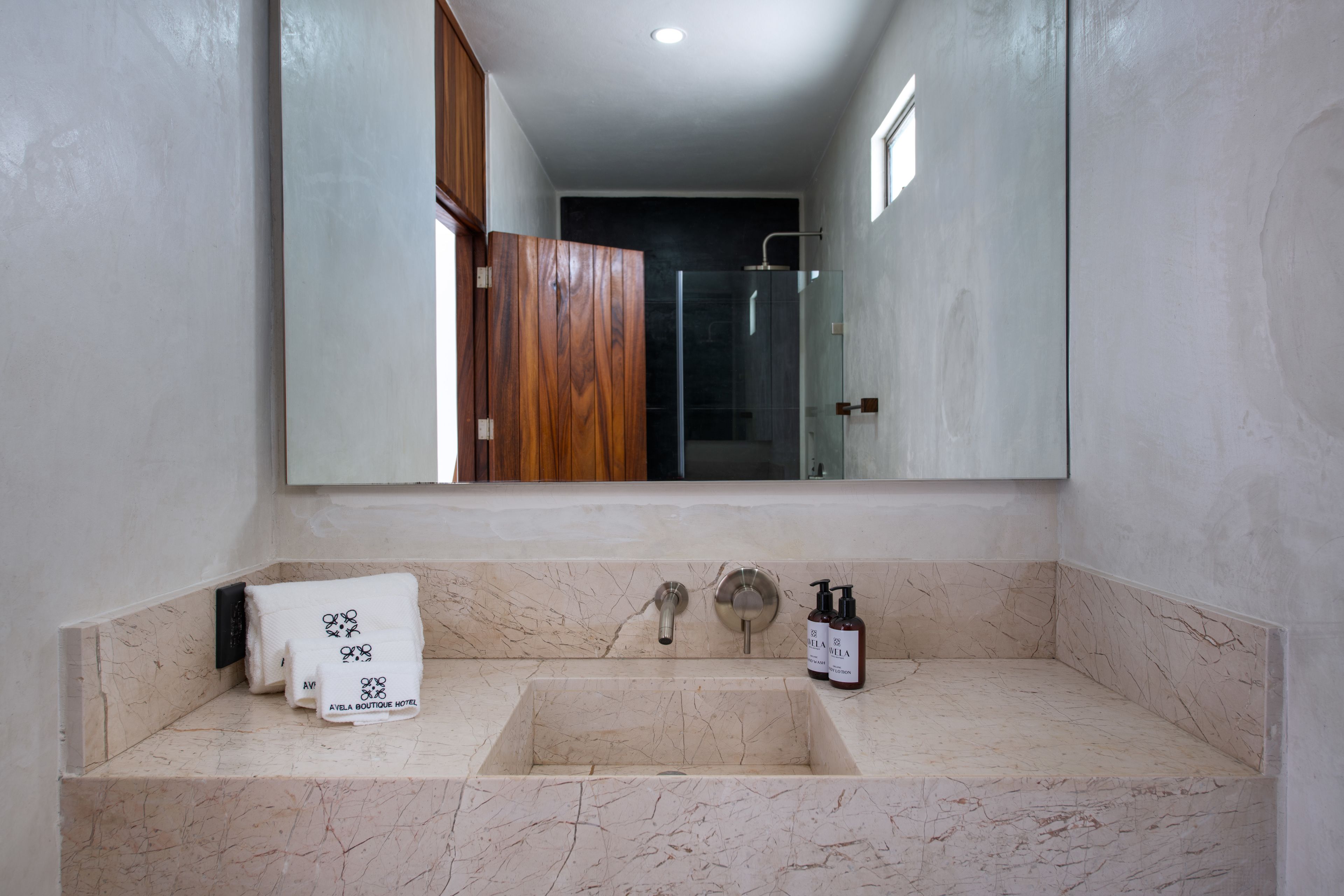 shower, rainfall showerhead, designer toiletries, hair dryer