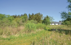 Escape to a serene retreat surrounded by lush greenery and tranquil surroundings.