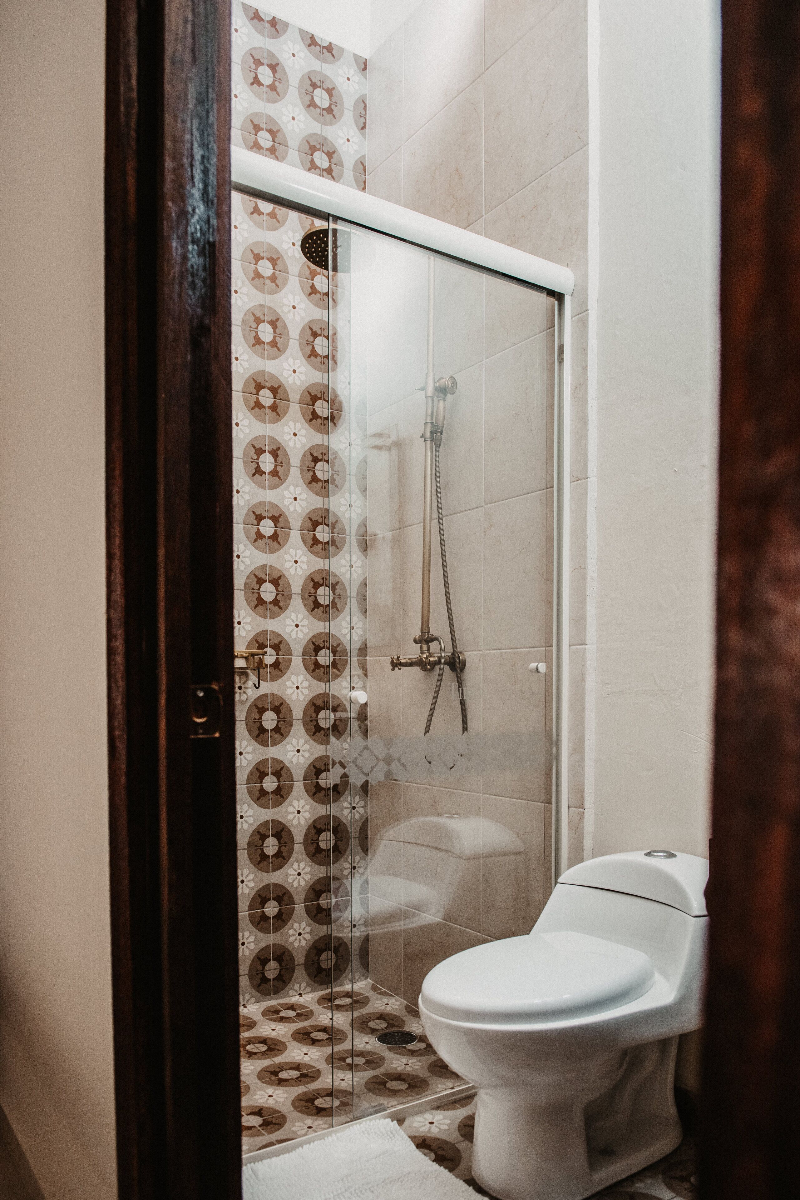 superior room, 1 king bed, non smoking, city view | bathroom | shower, rainfall showerhead, free toiletries, towels