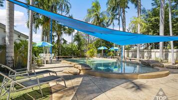 Outdoor pool, open 8:00 AM to 8:00 PM, pool loungers