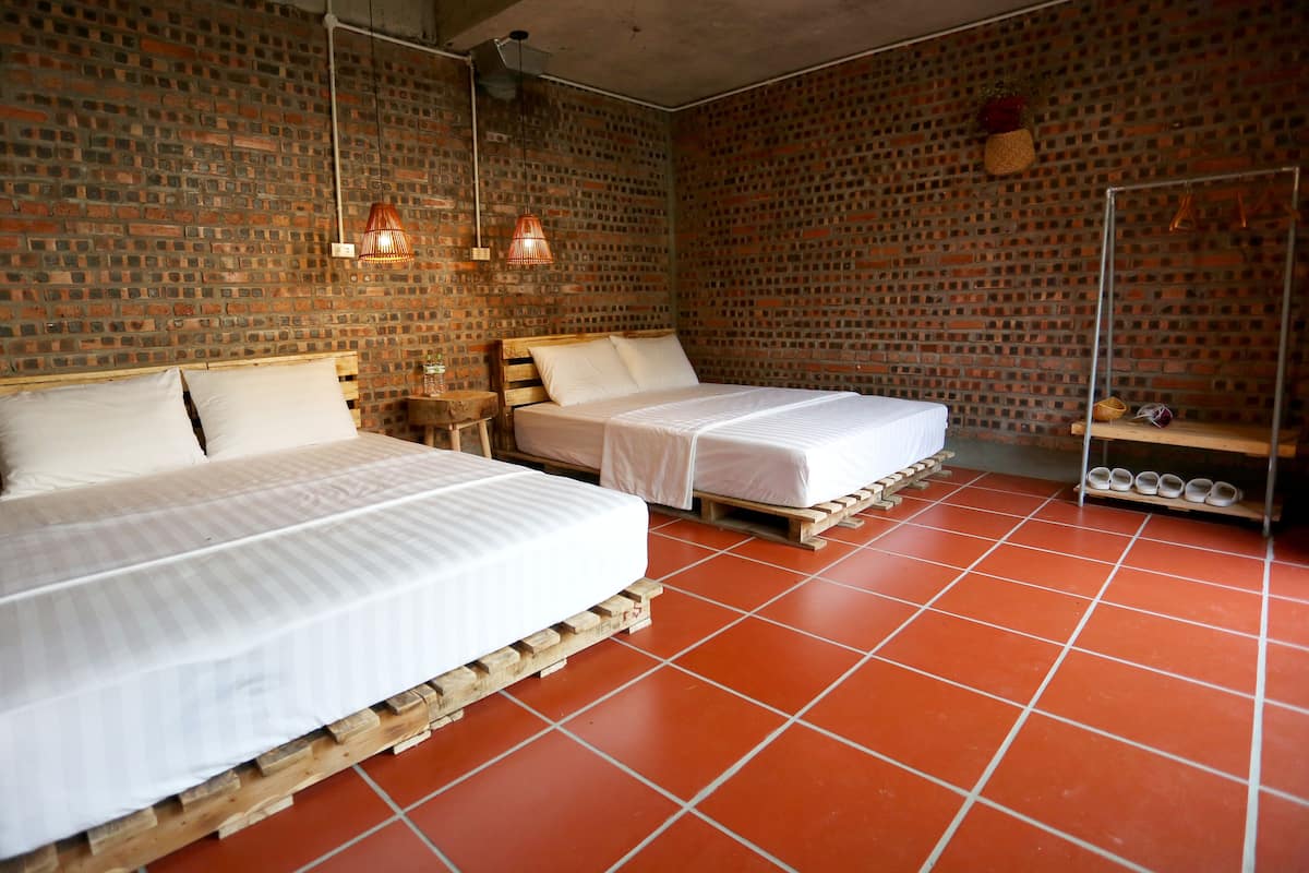 Chambre quadruple, vue sur le jardin (Private) | Aire de séjour