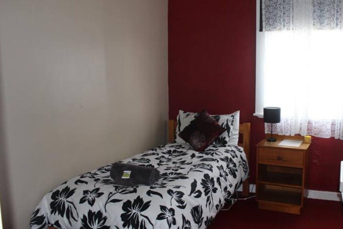 Basic Twin Room | Iron/ironing board (on request), bed sheets