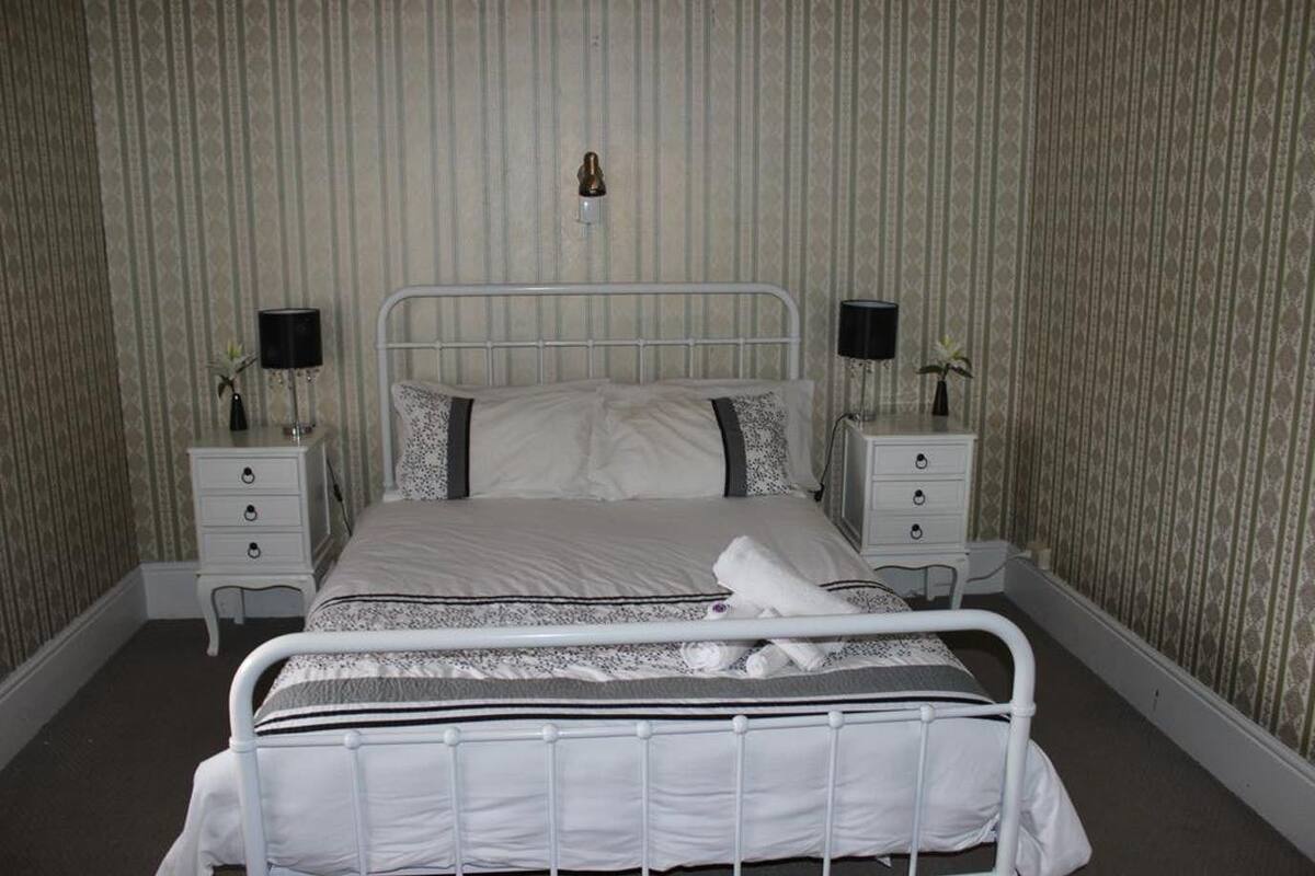 Basic Double Room | Iron/ironing board (on request), bed sheets