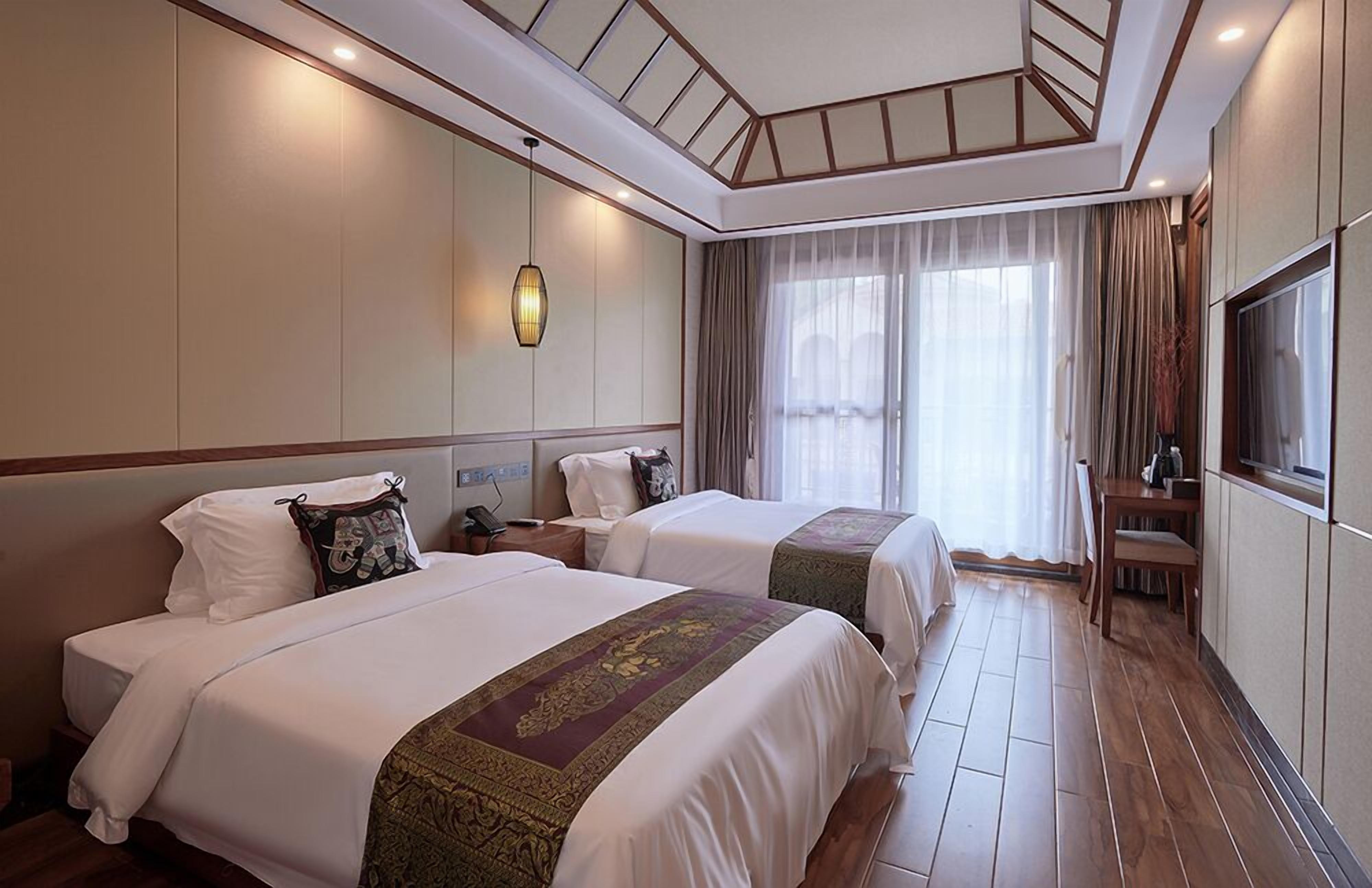 executive twin room | hypo-allergenic bedding, down duvets, memory-foam beds, free minibar