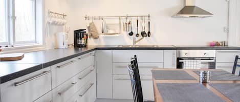 Fridge, stovetop, coffee/tea maker