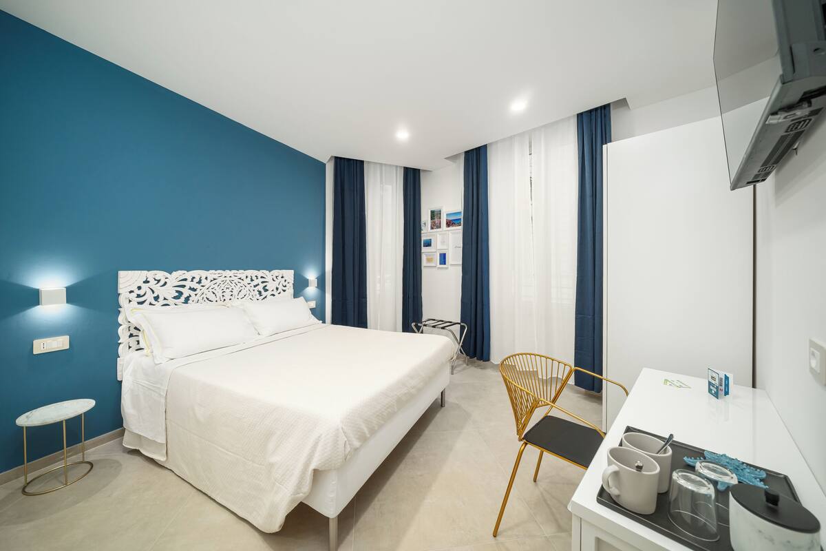 Deluxe Room, 1 Queen Bed, Private Bathroom, City View | Desk, soundproofing, cribs (free), WiFi (free)