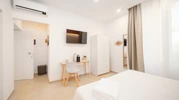 Deluxe Room, 1 Queen Bed, Private Bathroom, City View | Individually furnished, desk, soundproofing, free cots/infant beds