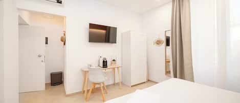 Deluxe Room, 1 Queen Bed, Private Bathroom, City View | Individually furnished, desk, soundproofing, free cribs/infant beds
