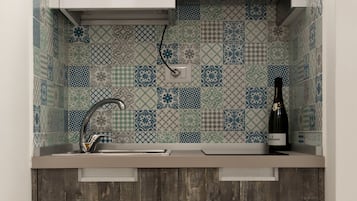 Apartment, 1 Queen Bed | Private kitchen | Espresso maker, coffee/tea maker, electric kettle