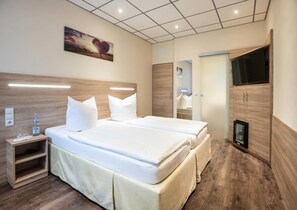 Literie hypoallergénique, minibar, coffres-forts dans les chambres