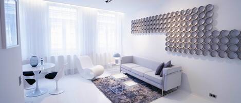 Design Apartment, Multiple Beds, Non Smoking | Living area | 150-cm Smart TV with premium channels, TV