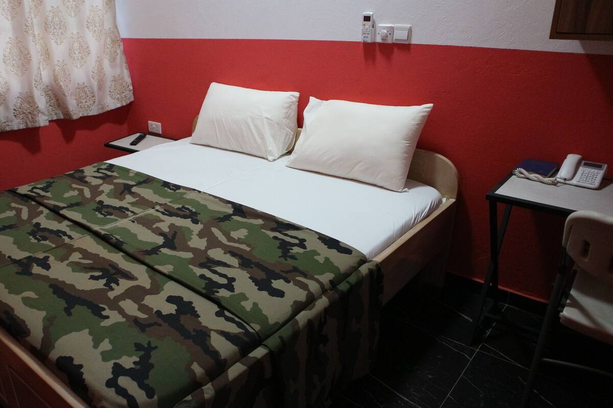 Desk, free WiFi, bed sheets