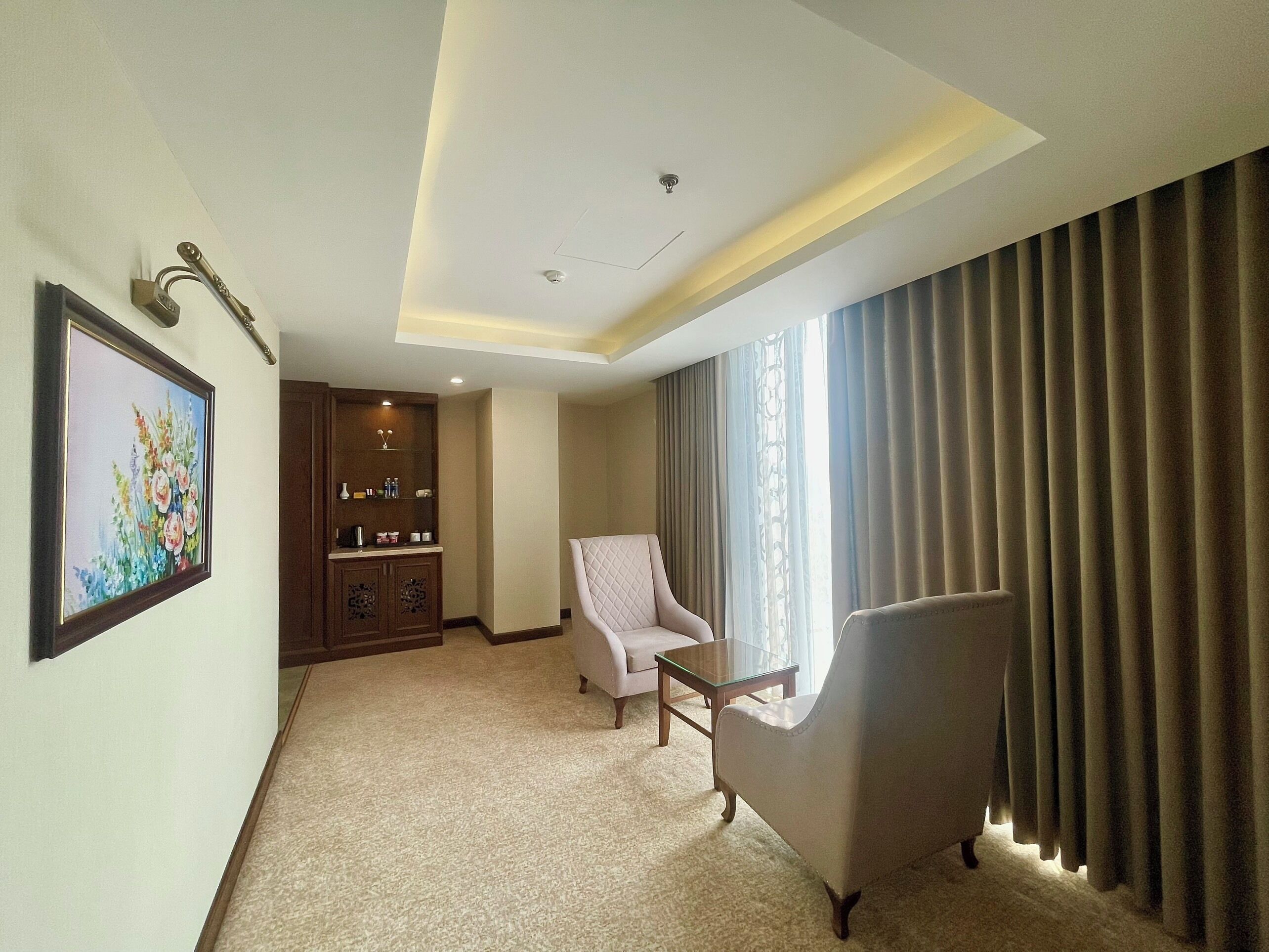 Junior Double Room, Balcony, City View | Living area | 40-inch LED TV with cable channels, TV