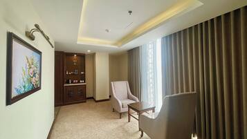 Junior Double Room, Balcony, City View | Living area | 40-inch LED TV with cable channels, TV