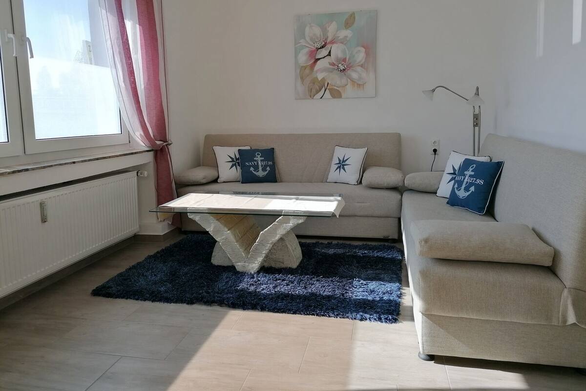 Appartement, plusieurs lits, non-fumeurs | Coin séjour | Télévision à écran plat