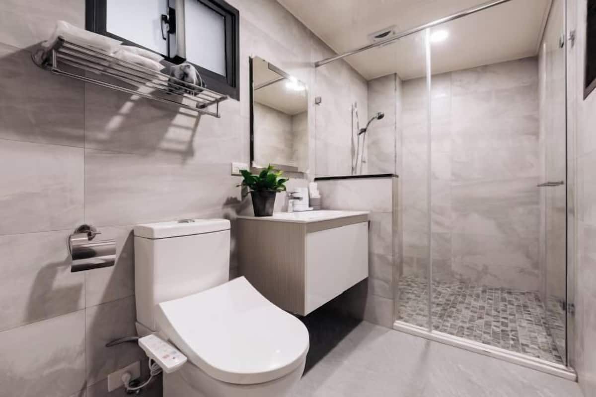 Bathroom | Hair dryer, slippers, electronic bidet, towels