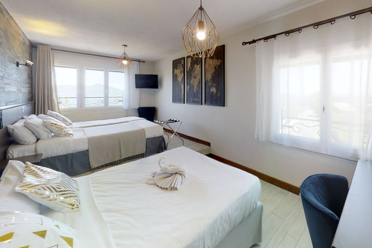 superior quadruple room, multiple beds, non smoking, lake view | minibar, desk, blackout curtains, soundproofing