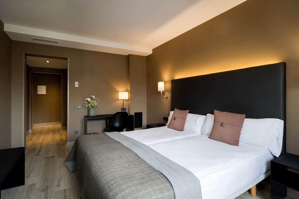 Desk, free WiFi, bed sheets