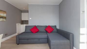 Apartment, 1 Bedroom | Living area | Flat-screen TV
