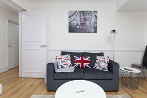 Apartment, 2 Bedrooms | Living area | 32-inch flat-screen TV with digital channels, TV - Victoria Magical Atmosphere with Patios (London)