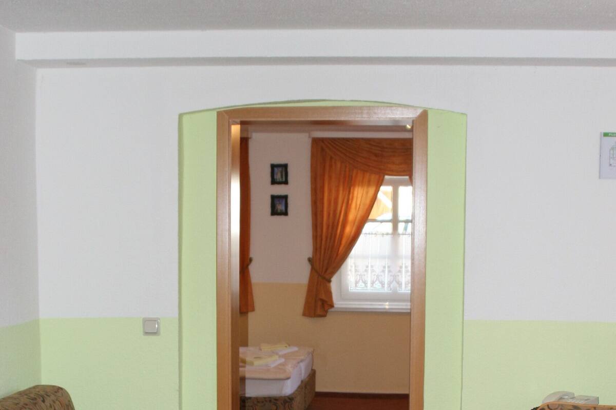 basic double room, non smoking | living area | flat-screen tv